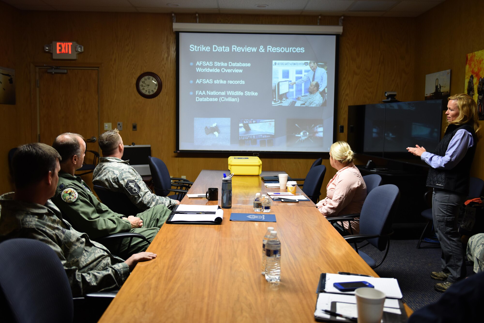 Director of Environmental Resource Solutions Southwest Florida Region and wildlife biologist, Sarah Brammell, assigned to the Air National Guard’s Bird Aircraft Strike Hazard team, presents a briefing to members of the 180th Fighter Wing, Ohio Air National Guard, on the purpose of the BASH site visit, April 13, 2017. Wildlife-related incidents were documented as the leading cause of F-16 fighter jet mishaps in the first quarter of 2017. In an effort to mitigate impact to the mission and maximize the safety of pilots, aircraft and the abundant local-area wildlife, the 180FW, Ohio Air National Guard, hosted a Bird Aircraft Strike Hazard team visit to assess potential bird and other wildlife hazards located on and around the airfield at Toledo Express Airport in Swanton, Ohio. Ohio. Air National Guard Photo by Senior Master Sgt. Beth Holliker.