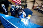 The initials of the ship’s sponsor, Barbara Taylor, were welded onto a keel plate that will be permanently affixed to the future USS St. Louis (LCS 19) in Marinette, Wisconsin, May 19.