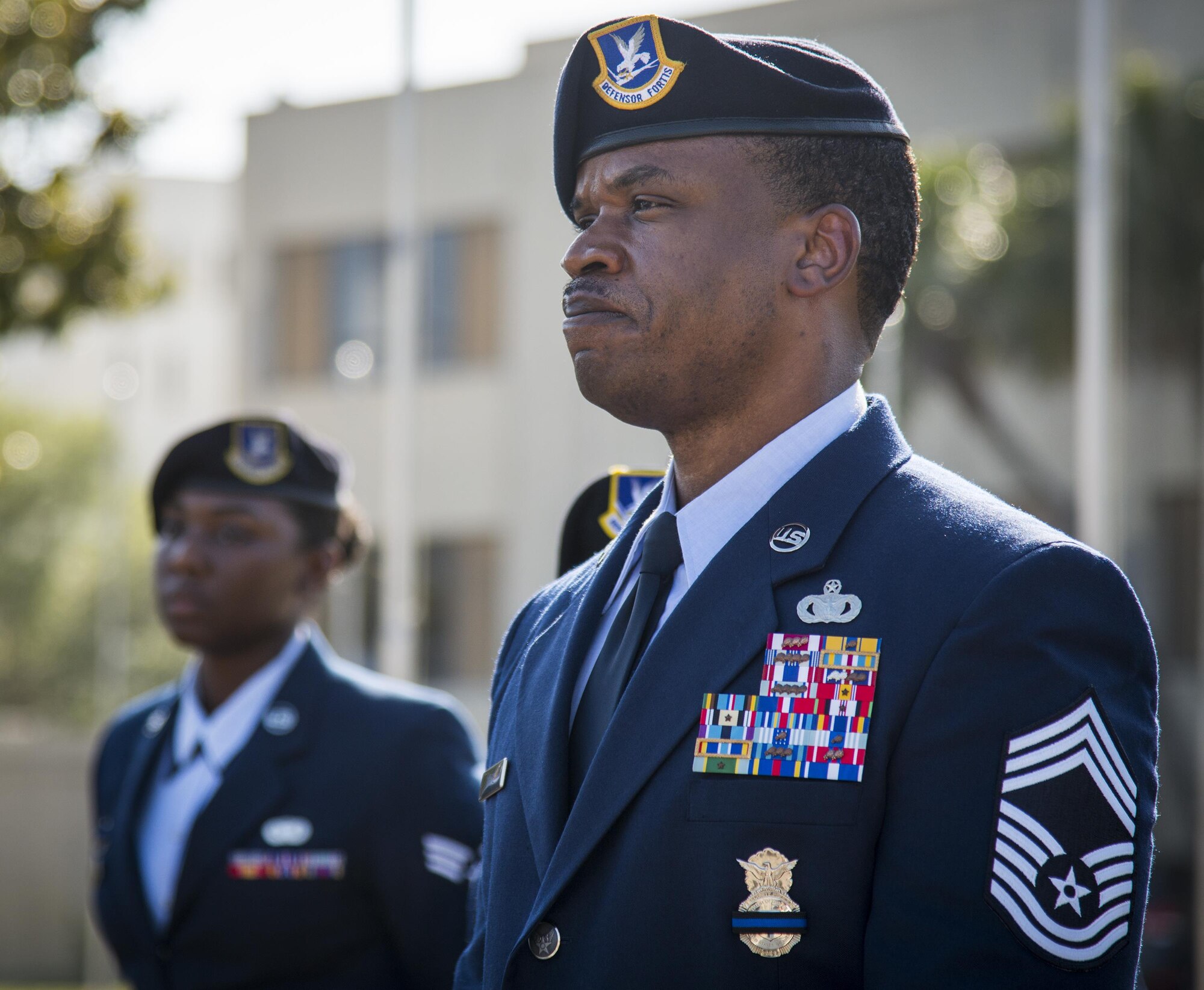 Chief Master Sgt. Mario White, 96th Security Forces Squadron, stands with his Airmen after the base retreat ceremony May 19 at Eglin Air Force Base, Fla.  The retreat ceremony closed out the base’s Police Week activities.  (U.S. Air Force photo/Cheryl Sawyers)