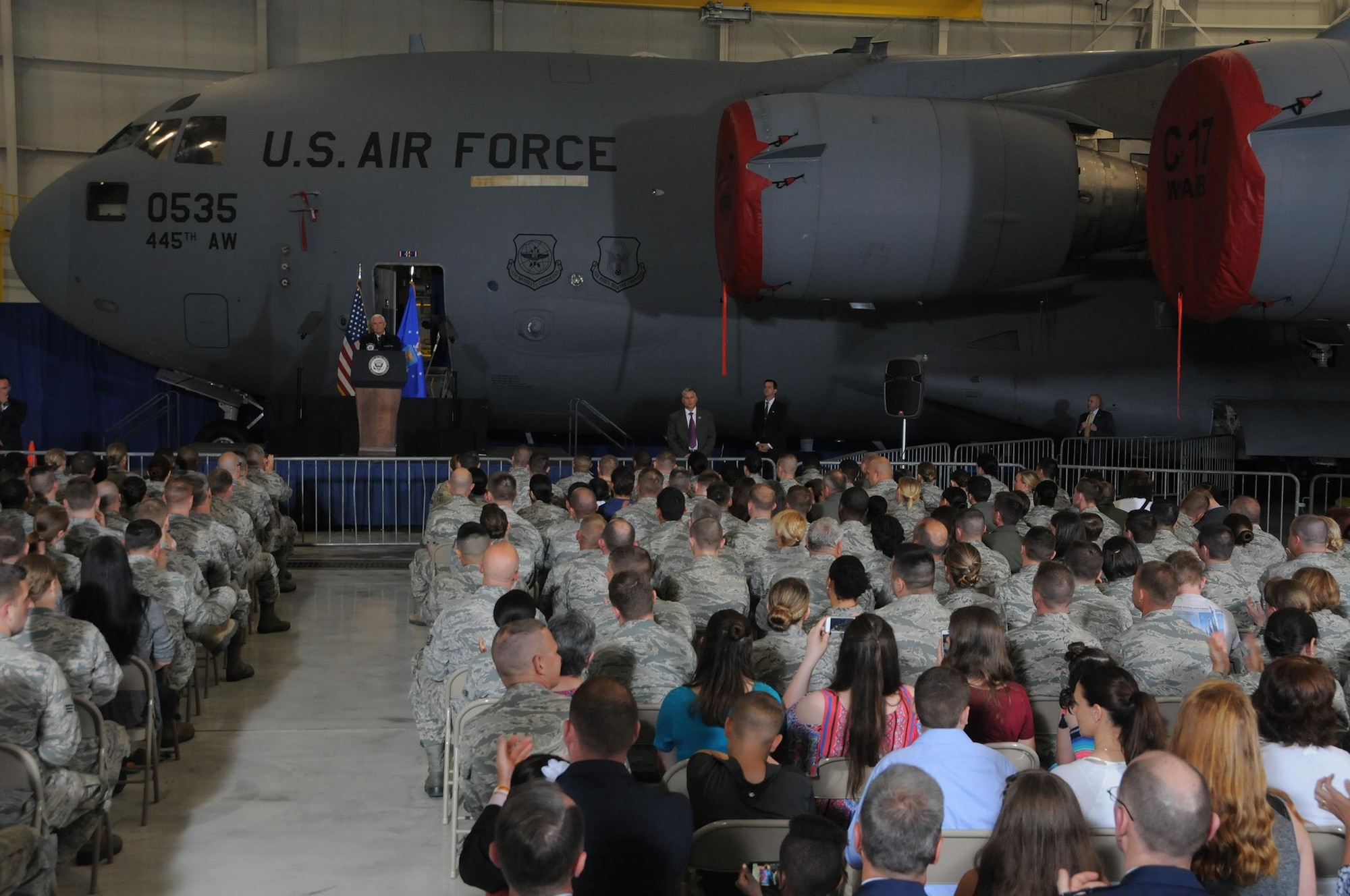 Vice President Mike Pence speaks to a crowd of approximately 250 Airmen and families inside a 445th Airlift Wing hangar Saturday, May 20, 2017. The vice president visited Wright-Patterson Air Force Base to commemorate Armed Forces Day. (U.S. Air Force photo/Tech. Anthony Springer)