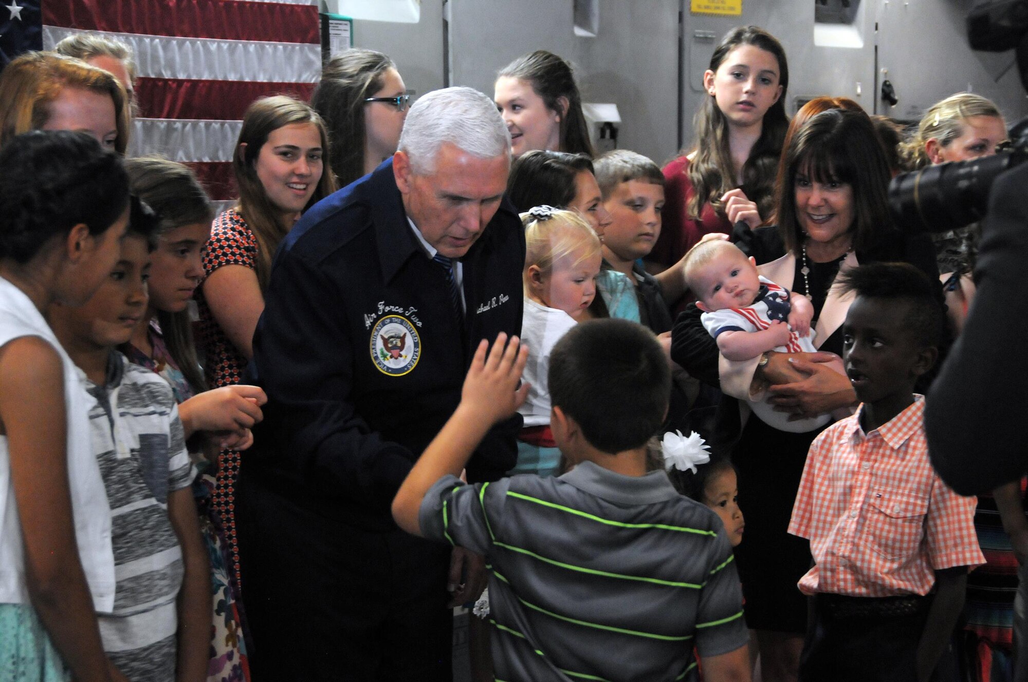 Vice President Mike Pence and his wife Karen visit with children of military members inside a 445th Airlift Wing C-17 Globemaster III Saturday, May 20, 2017. The vice president visited Wright-Patterson Air Force Base to speak to approximately 250 Airmen and families to commemorate Armed Forces Day. (U.S. Air Force photo/Tech. Sgt. Anthony Springer)