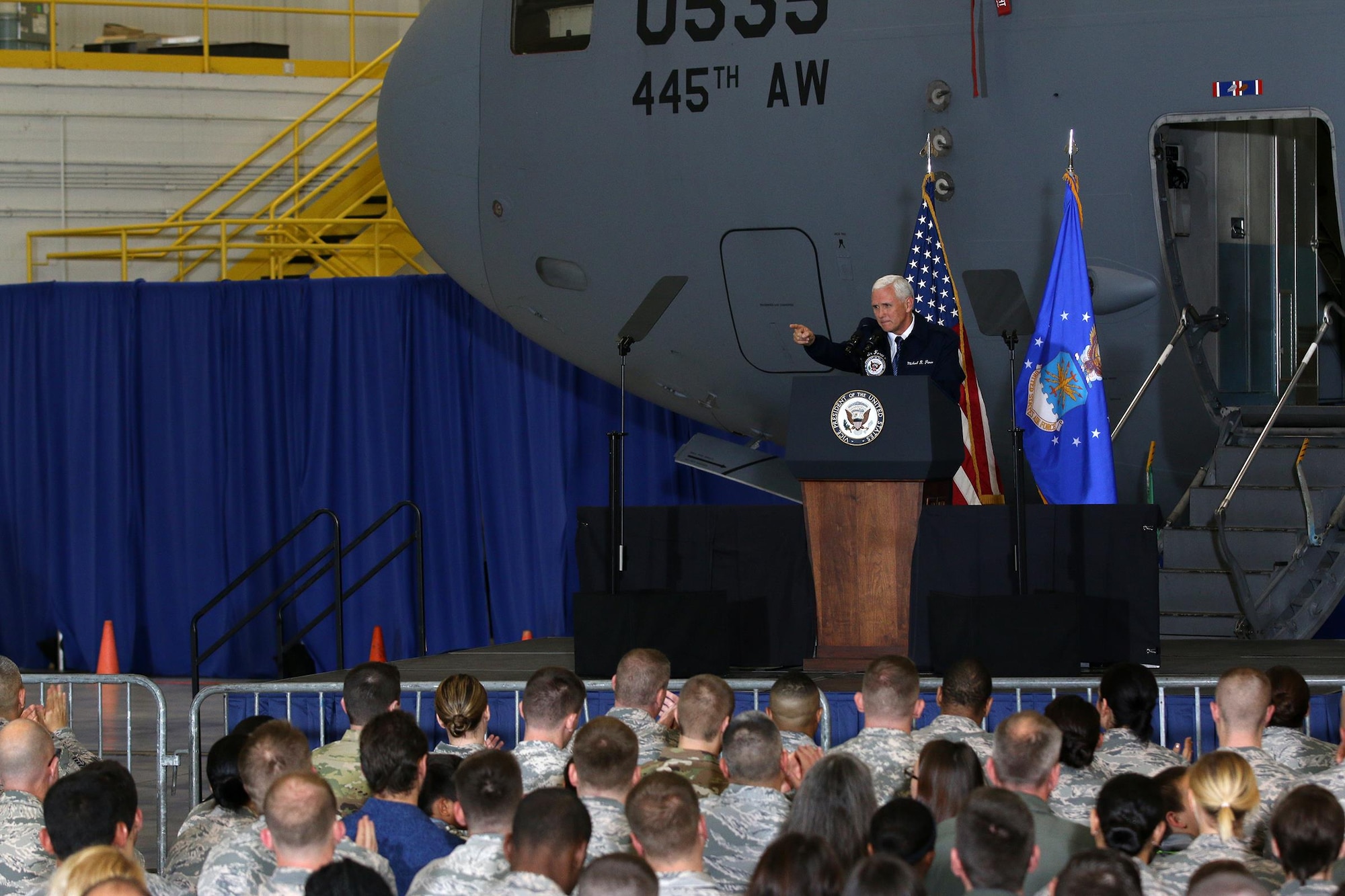 Vice President Mike Pence speaks to a crowd of approximately 250 Airmen and families inside a 445th Airlift Wing hangar Saturday, May 20, 2017. The vice president visited Wright-Patterson Air Force Base to commemorate Armed Forces Day. (U.S. Air Force photo/Tech. Sgt. Patrick O’Reilly)