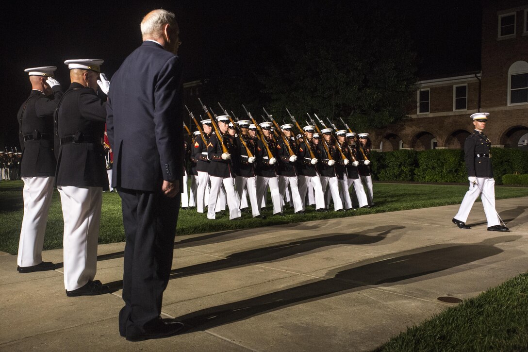The Marines with Marine Barracks Washington D.C., conduct pass in review at the end of a Friday Evening Parade at the Barracks, May 19, 2017. The guest of honor for the parade was Secretary of Homeland Security, John F. Kelly, and the hosting official was Commandant of the Marine Corps Gen. Robert B. Neller. (Official Marine Corps photo by Cpl. Robert Knapp/Released)