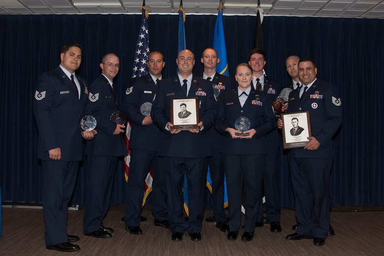 PETERSON AIR FORCE BASE, Colo. – Forrest L. Vosler NCO Academy class 17-5 students graduate with academic or distinguished awards at The Club, May 19, 2017, at Peterson Air Force Base, Colo. The NCOs completed 25 academic days covering multiple training tasks on self-improvement, adaptability, effective negotiations and leadership. The class also volunteered a total of 241 hours throughout the community on top of their academic studies. (U.S. Air Force photo by Staff Sgt. Tiffany Lundberg) 