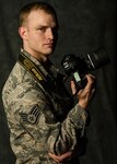 Air Force Staff Sgt. Colton Elliott has faced much adversity throughout his life and now he’s found a home with the Air National Guard. Elliott, a photojournalist with the Missouri Air National Guard’s 131st Bomb Wing, poses for a photo at Whiteman Air Force Base, Mo., April 2, 2017. 