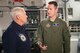 Vice President Mike Pence listens as Staff. Sgt. Jason Benedict, 89th Airlift Squadron load master, talks about the capabilities of the C-17 Globemaster III aircraft during a visit to Wright-Patterson Air Force Base, Ohio, May 20, 2017. During his visit, Pence commemorated Armed Forces Day, addressing a crowd of more than 200 Airmen and their families, thanking them for their service. (U.S. Air Force photo by Wesley Farnsworth)