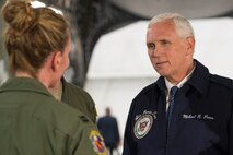 Vice President Mike Pence listens as Capt. Stacey Blurton, 445th Aeromedical Evacuation Squadron flight nurse, explains the aeromedical capabilities of the C-17 Globemaster III aircraft during a visit to Wright-Patterson Air Force Base, Ohio, May 20, 2017. During his visit, Pence commemorated Armed Forces Day, addressing a crowd of more than 200 Airmen and their families, thanking them for their service. (U.S. Air Force photo by Wesley Farnsworth)