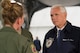 Vice President Mike Pence listens as Capt. Stacey Blurton, 445th Aeromedical Evacuation Squadron flight nurse, explains the aeromedical capabilities of the C-17 Globemaster III aircraft during a visit to Wright-Patterson Air Force Base, Ohio, May 20, 2017. During his visit, Pence commemorated Armed Forces Day, addressing a crowd of more than 200 Airmen and their families, thanking them for their service. (U.S. Air Force photo by Wesley Farnsworth)