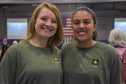 Mikaila Falash (left) and Anubis Ruiz Martinez (right) after receiving an "Our Community Salutes" certificate from Medal of Honor recipient Command Sergeant Major (Ret.) Kenneth E. Stumpf and Fort McCoy Senior Commander and 88th Regional Support Command Commanding General, Maj. Gen. Patrick Reinert during an “Our Community Salutes” event at Fort McCoy, Wisconsin on Armed Forces Day, May 20, to recognize and honor graduating high school seniors who have committed to enlist in the Armed Forces following high school graduation.