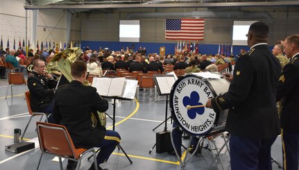 The 88th Regional Support Command’s 85th U.S. Army Band plays during an “Our Community Salutes” event at Fort McCoy, Wisconsin on Armed Forces Day, May 20, to recognize and honor graduating high school seniors who have committed to enlist in the Armed Forces following high school graduation.