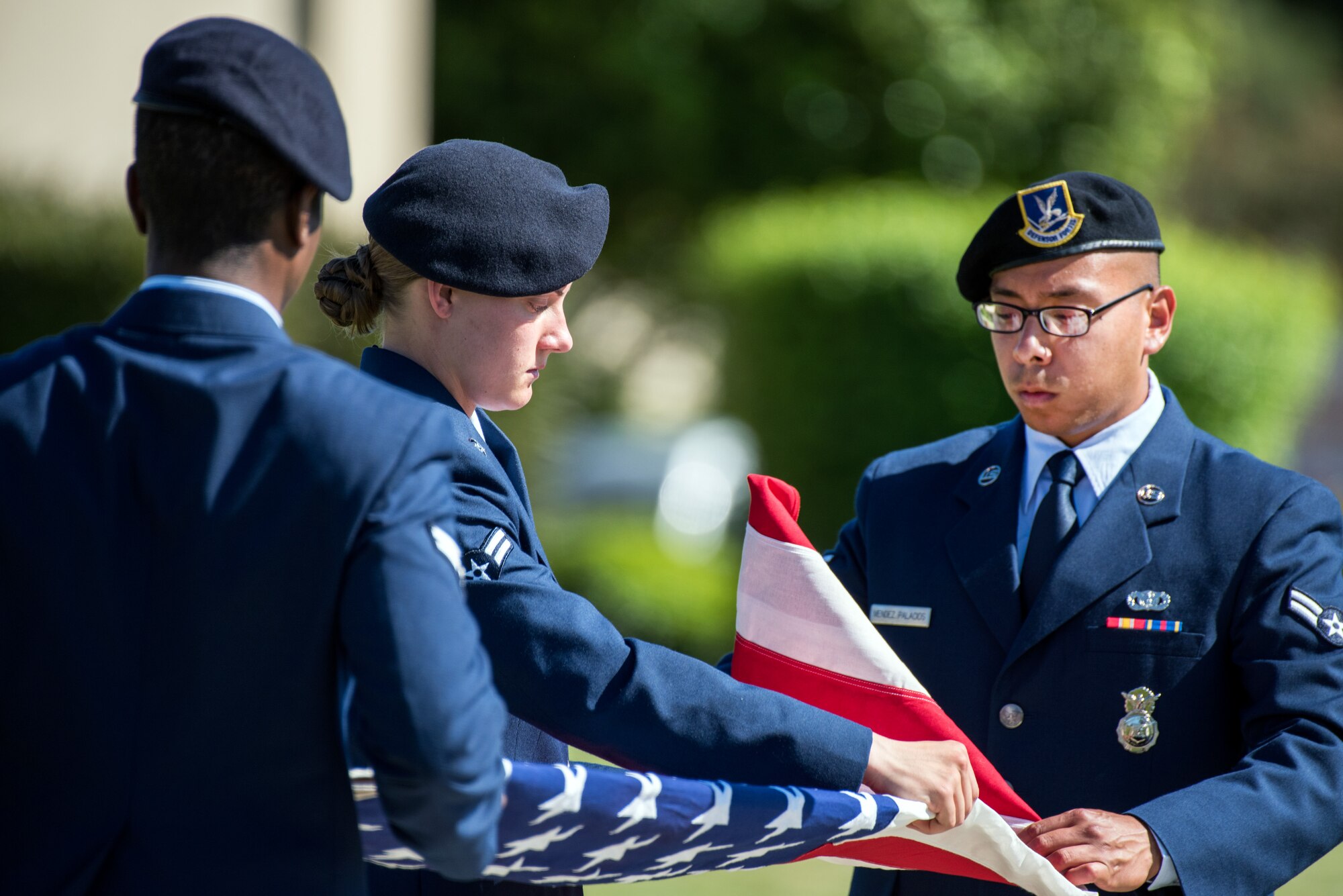 Defenders from the 60th Security Forces Squadron, Travis Air Force Base, Calif., perform a retreat ceremony May 18, 2017. The ceremony was one of several events sponsored by the squadron in honor of Police Week. (U.S. Air Force photo by Louis Briscese)