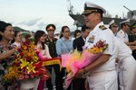 Capt. Stanfield Chien receives a welcoming gift from a People's Committee representative during the opening ceremony for Pacific Partnership 2017 Khanh Hoa, May 20, 2017. Pacific Partnership is the largest annual multilateral humanitarian assistance and disaster relief preparedness mission conducted in the Indo-Asia-Pacific and aims to enhance regional coordination in such as medical readiness and preparedness for manmade and natural disasters.