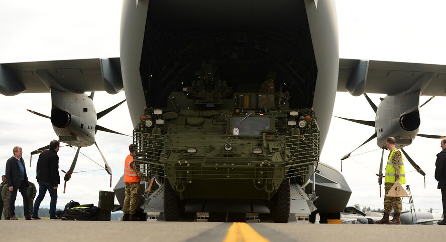 A Stryker vehicle is backed onto a Royal Air Force A-400M aircraft by 1st Stryker Brigade Combat Team Soldiers on the McChord Field flightline on May 18, 2017, at Joint Base Lewis-McChord, Wash. The Soldiers used the training opportunity to prep for Mobility Guardian, where dozens of international partners will be working together with U.S. Air Force and U.S. Army counterparts. (U.S. Air Force photo/Tech. Sgt. Tim Chacon)
