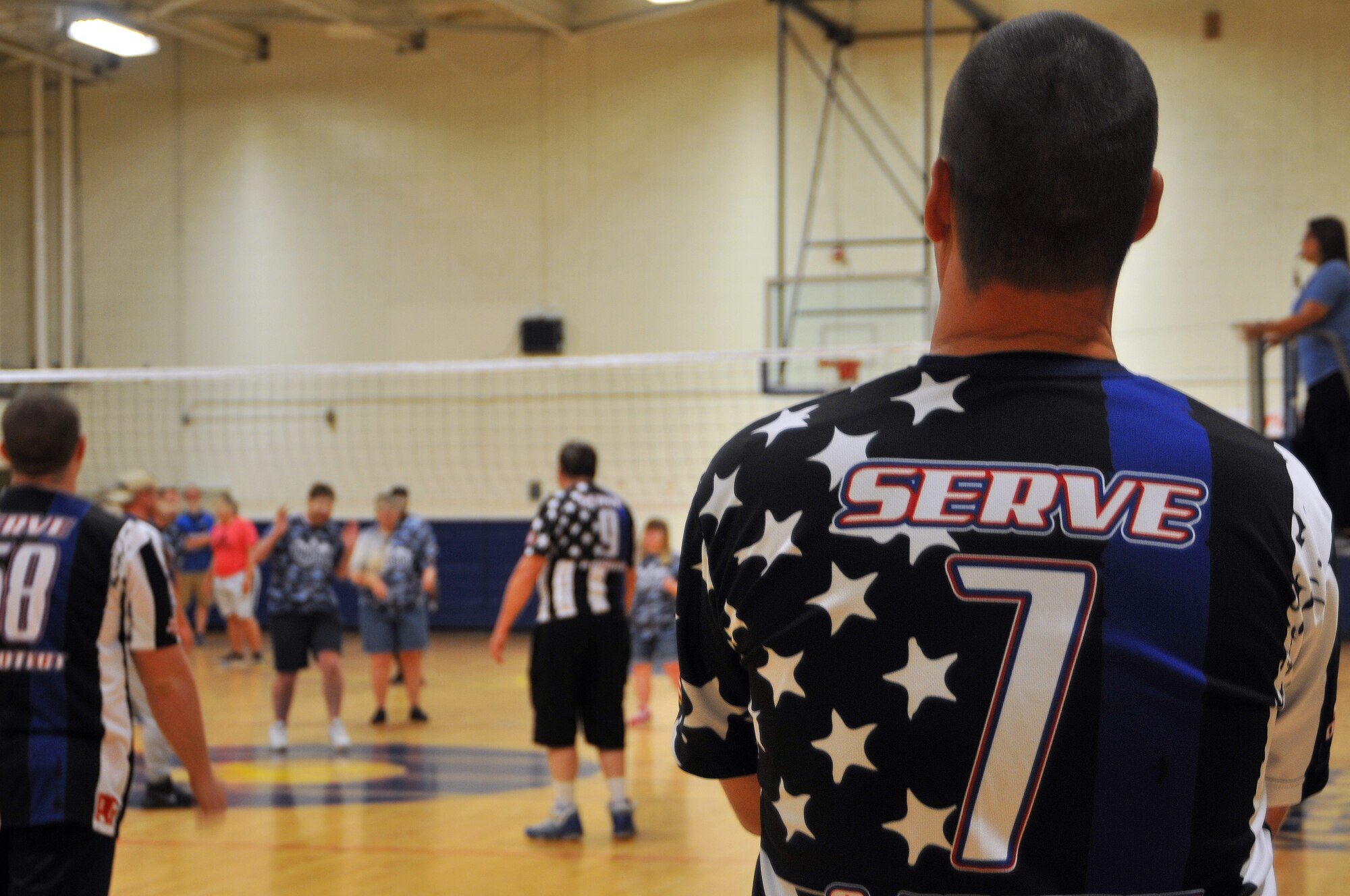 The ‘Boots’ and ‘Badges’ teams reset following a volley during the Boots vs. Badges volleyball game at the Blake Fitness Center, May 13, 2017, on Keesler Air Force Base, Miss. Keesler Airmen competed against City of Biloxi police officers and firefighters as the starting event for the 2017 Special Olympics Mississippi Summer Games, which will be hosted on base for the 31st year May 19-21. (U.S. Air Force photo by 2nd Lt. Teddy Barbosa)