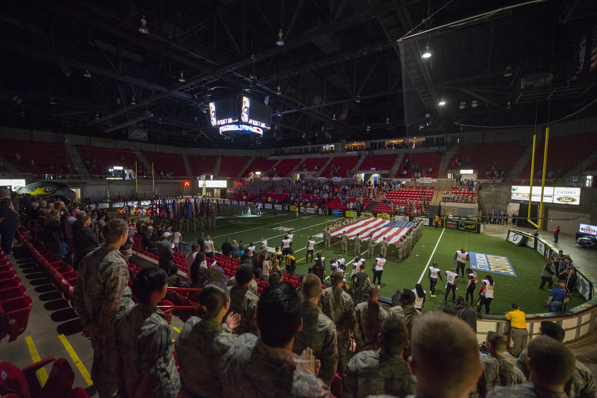 Airmen from Sheppard Air Force Base, Texas, participate as spectators, flag bearers, and demonstration squadrons for the Nighthawks military appreciation football game at the Kay Yeager Coliseum in downtown Wichita Falls, Texas, May 20, 2017. The game was close, but the Nighthawks lost with a final score of 47 to 50 against the Iowa Barnstormers. (U.S. Air Force photo by 2nd Lt. Jacqueline Jastrzebski)