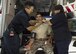 Hector Maldonado, a 49th Medical Operations Squadron emergency medical technician-Intermediate, and Annette Dunlap, the 49th MDOS area project manager and a paramedic, perform an emergency response simulation on a volunteer for National Emergency Medical Services week at Holloman Air Force Base, N.M. on May 18, 2017. National EMS week was established in 1974, as a means to honor EMS practitioners and their contributions to families and communities across the United States. Holloman’s EMS practitioners work 24-hour shifts. The most basic function of their job involves responding to 911 and flight line emergencies. (U.S. Air Force photo by Airman 1st Class Alexis P. Docherty)