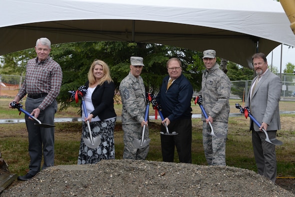 U.S. Air Force Col. David Mineau, the 354th Fighter Wing (FW) commander, and Chief Master Sgt. Brent Sheehan, the 354th FW command chief, break ground for the new community center with several representatives from various agencies, May 22, 2017, at Eielson Air Force Base, Alaska. The plans for the building are to start small and leave room for future additions once an evaluation of the base is done when the 3,500 expected personnel arrive for the F-35A Lightning II. (U.S. Air Force photo by Senior Airman Kahdija Slaughter)