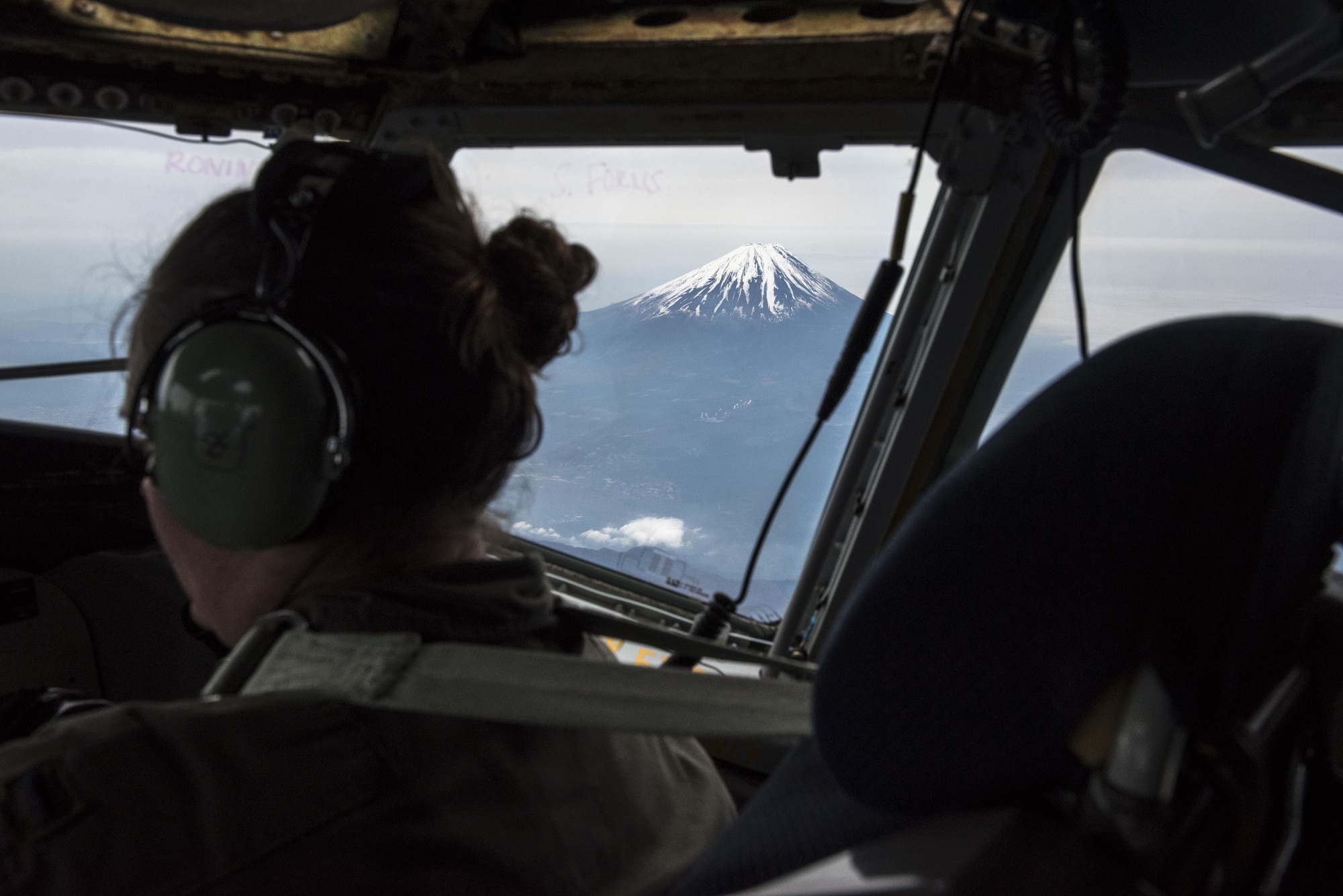 A U.S. Air Force KC-135 Stratotanker pilot from the 909th Air Refueling Squadron approaches Yokota Air Base, Japan, for a landing May 3, 2017. The aircraft diverted to Yokota AB to provide aeromedical evacuation support for two patients. Members of 18th Aeromedical Evacuation Squadron are constantly flying and training with 909th ARS Stratotankers to practice swift and effective medical transportation to those in need. (U.S. Air Force photo by Senior Airman John Linzmeier) 