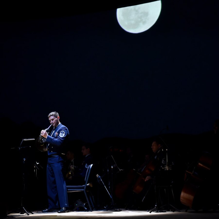 The performance this past Friday of Oliver Messiaen's From the Canyons to the Stars at DAR Constitution Hall featured several soloists. Here, MSgt Brett Miller, principal horn, has the stage to himself for one of the movements. (U.S. Air Force photos/CMSgt Bob Kamholz/released)
