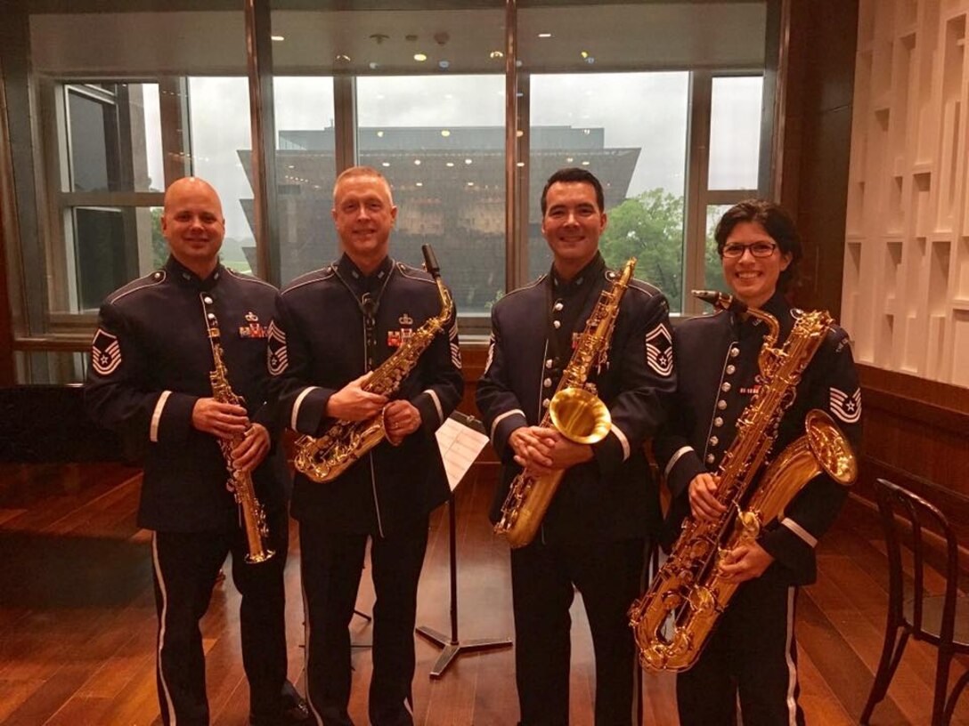 The Air Force Band saxophonists performed an exciting and diverse lunch time concert at the National Museum of American History this week. The band excels at sending out all sizes of musical groups to spread patriotism and good will throughout the National Captial Region. (photos/Molly Orlando/released)