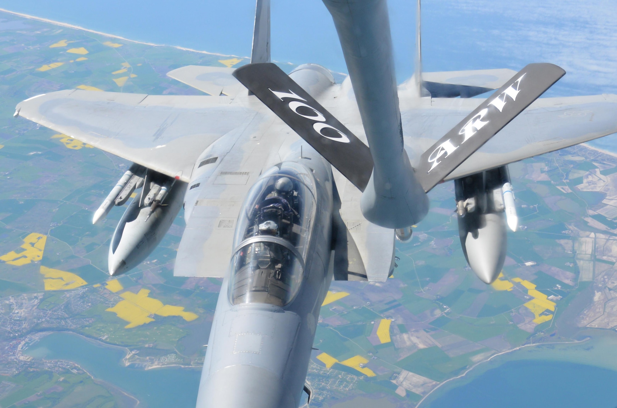 An F-15E Strike Eagle from RAF Lakenheath, England, receives fuel from a KC-135 Stratotanker, May 19, 2017. The KC-135 is assigned to RAF Mildenhall, England. Both aircraft are on their way to support Arctic Challenge 2017, a multinational exercise encompassing 11 nations and more than 100 aircraft. Air Force photo by Tech. Sgt. David Dobrydney