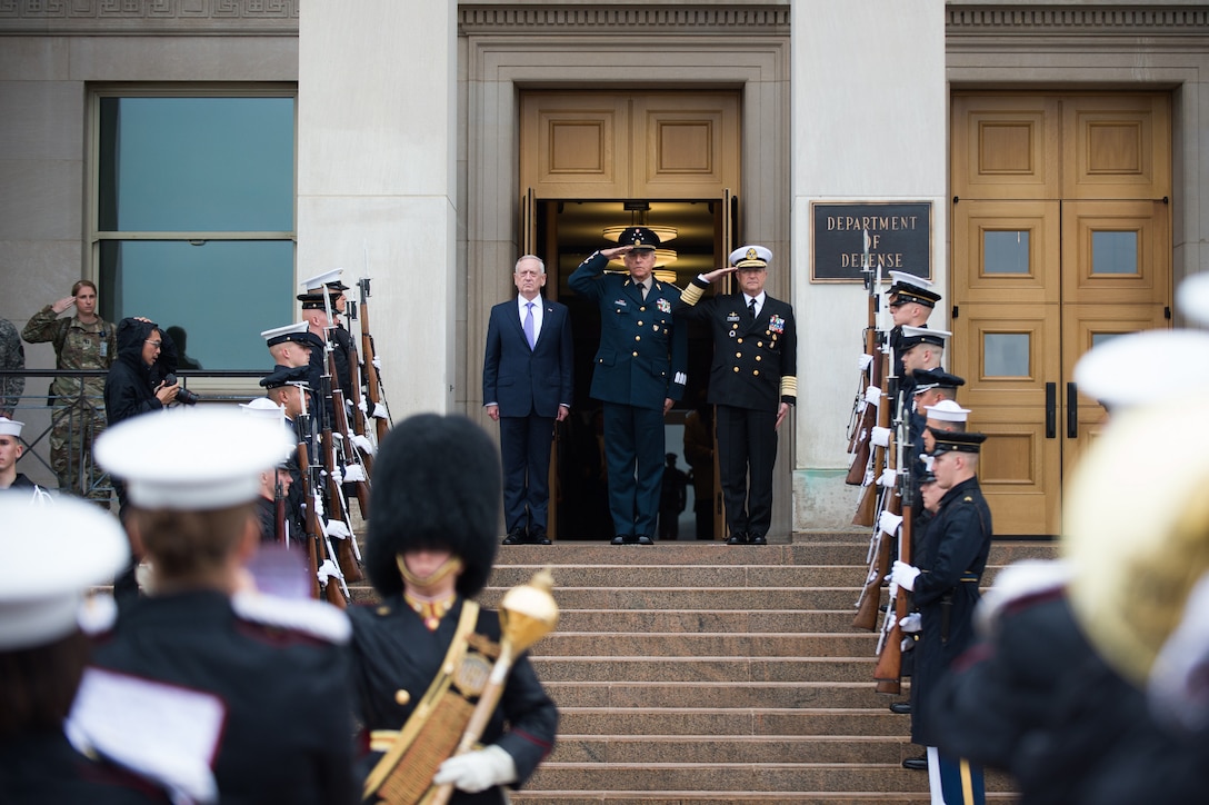 Defense Secretary Jim Mattis stands with Mexican National Defense Secretary Gen. Salvador Cienfuegos Zepeda, center, and Mexican Navy Secretary Adm. Vidal Francisco Soberon Sanz during an honor cordon at the Pentagon, May 22, 2017. DoD photo by Army Sgt. Amber I. Smith