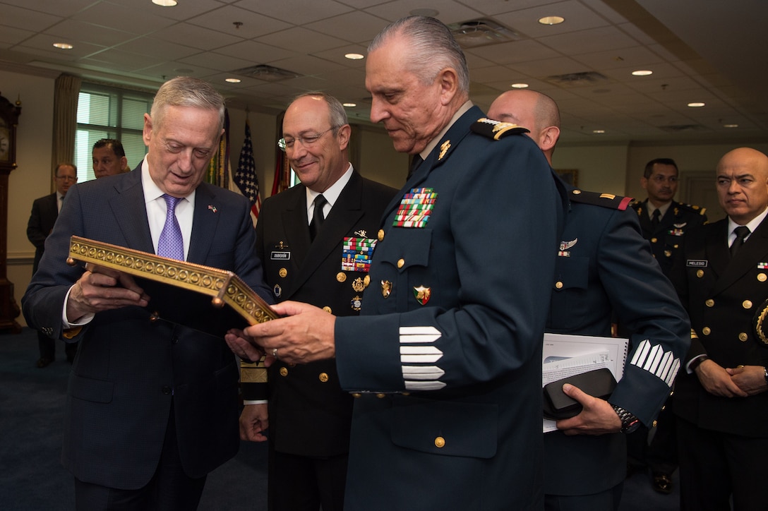 Defense Secretary Jim Mattis talks with Mexican National Defense Secretary Gen. Salvador Cienfuegos Zepeda, right, and Mexican Navy Secretary Adm. Vidal Francisco Soberon Sanz, center, at the Pentagon, May 22, 2017. DoD photo by Army Sgt. Amber I. Smith