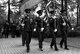 Members of the Ramstein High School Air Force Junior Reserve Officer Training Corps lead a procession of Kaiserslautern Military Community members to the gravesite of 452 American children during the Ramstein Area Chief's Group and German-American and International Women's Club's Kindergraves Memorial Service in Kaiserslautern, Germany, May 20, 2017. The ceremony is held annually to honor the children who were lost from 1952 to 1971. The memorial ceremony included an invocation, laying wreaths, candle lighting, and a blessing of the graves. (U.S. Air Force photo by Senior Airman Tryphena Mayhugh)