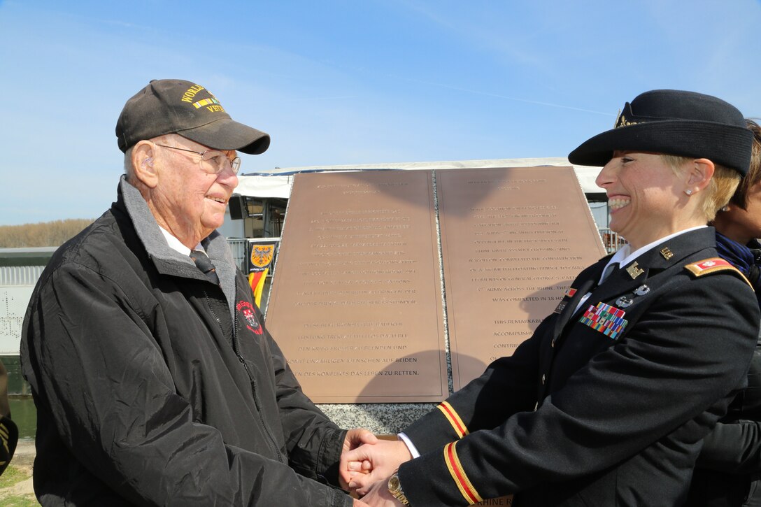 U.S. and German government and military officials honored the bravery and accomplishments of the 249th Engineer Battalion March 25 by unveiling a World War II monument dedicated to them on the riverbank of the Rhine in Neirstein, Germany.