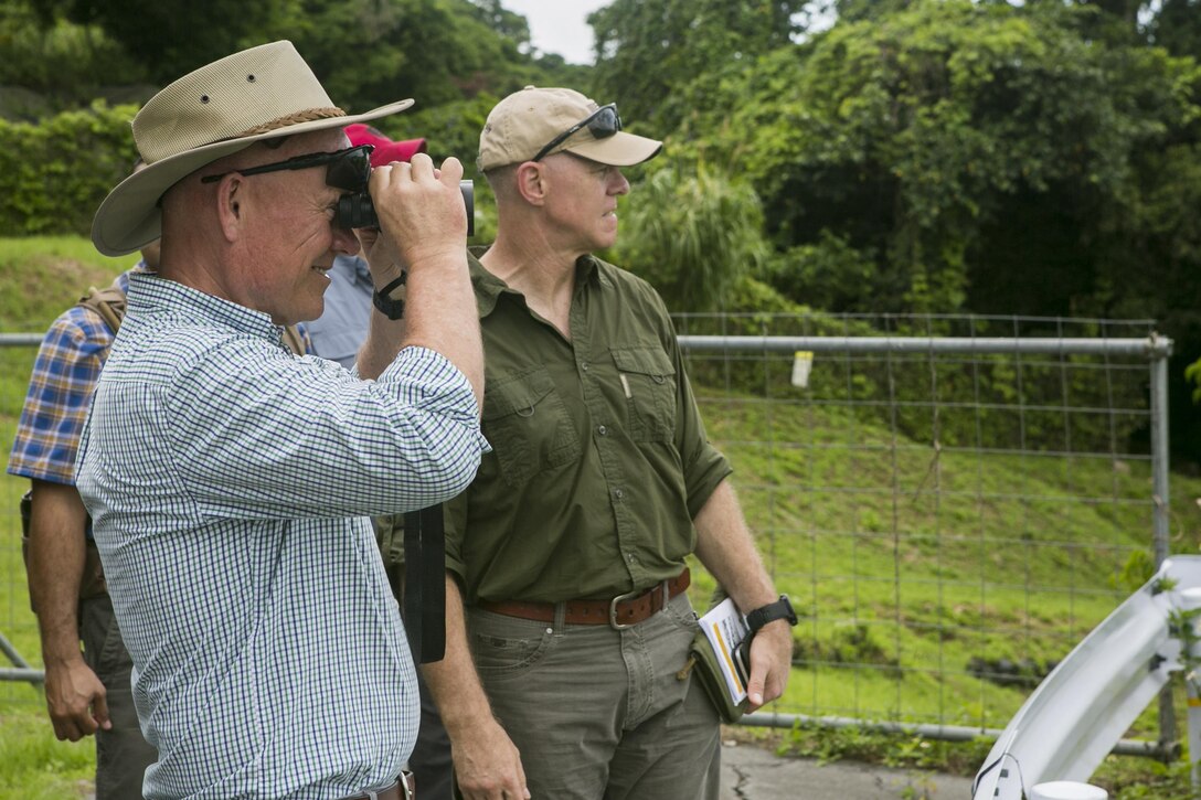 U.S. Marine Corps Lt. Gen. Lawrence D. Nicholson, III Marine Expeditionary Force commanding general, looks through binoculars during a Battle of Okinawa Tour on Okinawa, Japan, May 15, 2017. The battle tour was conducted to build a greater understanding of Marine Corps history on Okinawa through facilitated discussion and a guided tour, while building camaraderie and esprit de corps among the III MEF staff. (U.S. Marine Corps photo by MCIPAC Combat Camera Lance Cpl. Sean M. Evans)