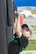 Michael Springstead, son of Jen Springstead from the 436th Comptrollers Squadron, climbs across an obstacle May 16, 2017, Dover Air Force Base, De. The obstacle was a part of a larger event put on by the Air Force Services Activity to showcase the new Alpha Warrior functional fitness battle station. (U.S. Air Force photo by Staff Sgt. Jared Duhon)