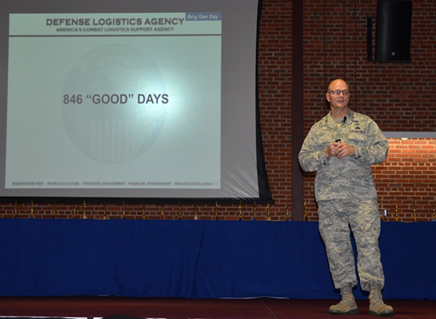 Defense Logistics Agency Aviation Commander Air Force Brig. Gen. Allan Day talks with the DLA Aviation workforce about his 846 “good” days as commander of DLA Aviation during his last Town Hall May 17, 2017 in the Frank B. Lotts Conference Center on Defense Supply Center Richmond, Virginia. (Photo by Jackie Roberts)