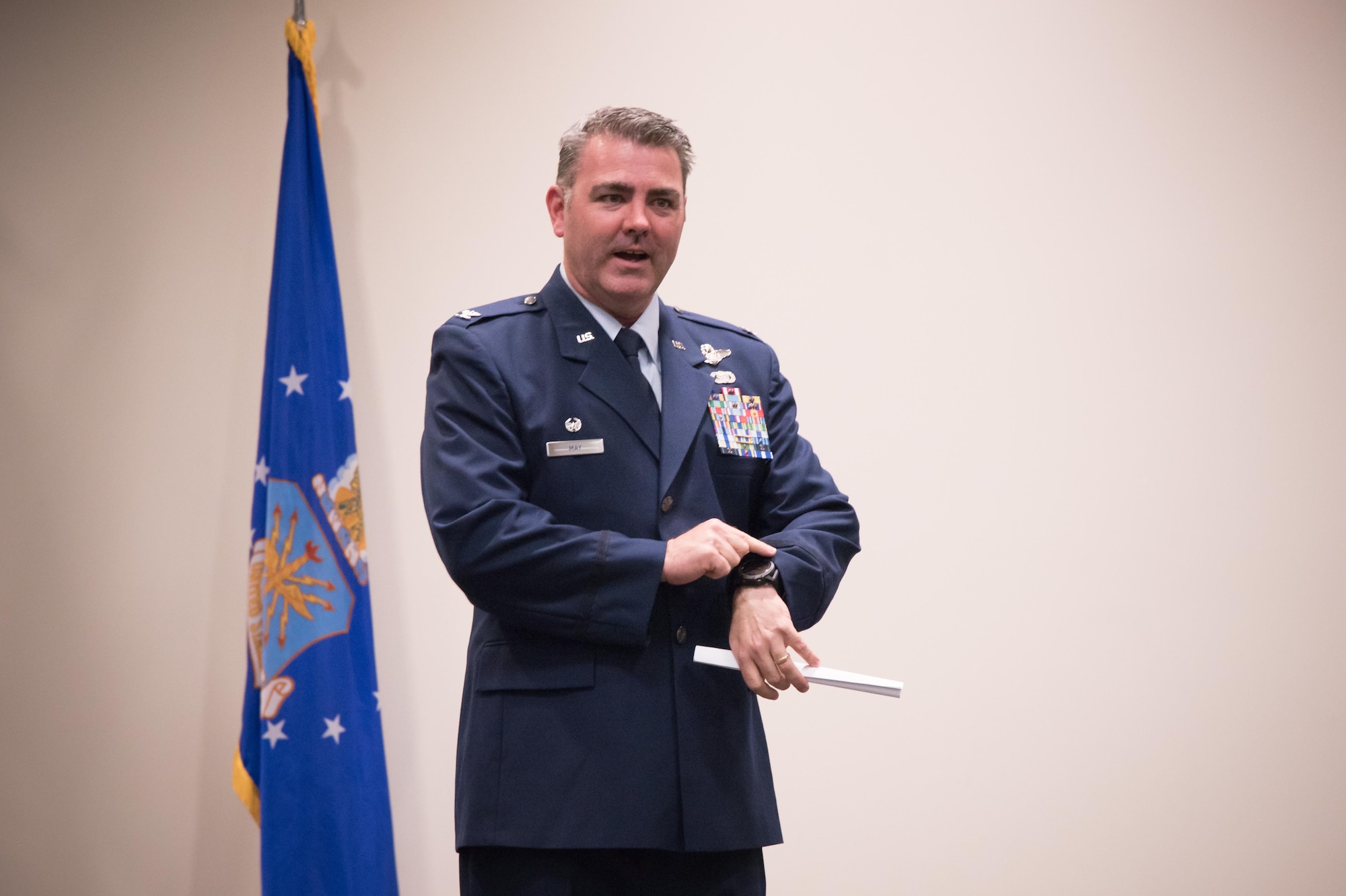 Col. Brian May, 403rd Operations Group commander speaks about the importance of trusting his people during his promotion ceremony March 4, 2017 at Keesler Air Force Base, Mississippi. (U.S. Air Force photo/Staff Sgt. Heather Heiney)