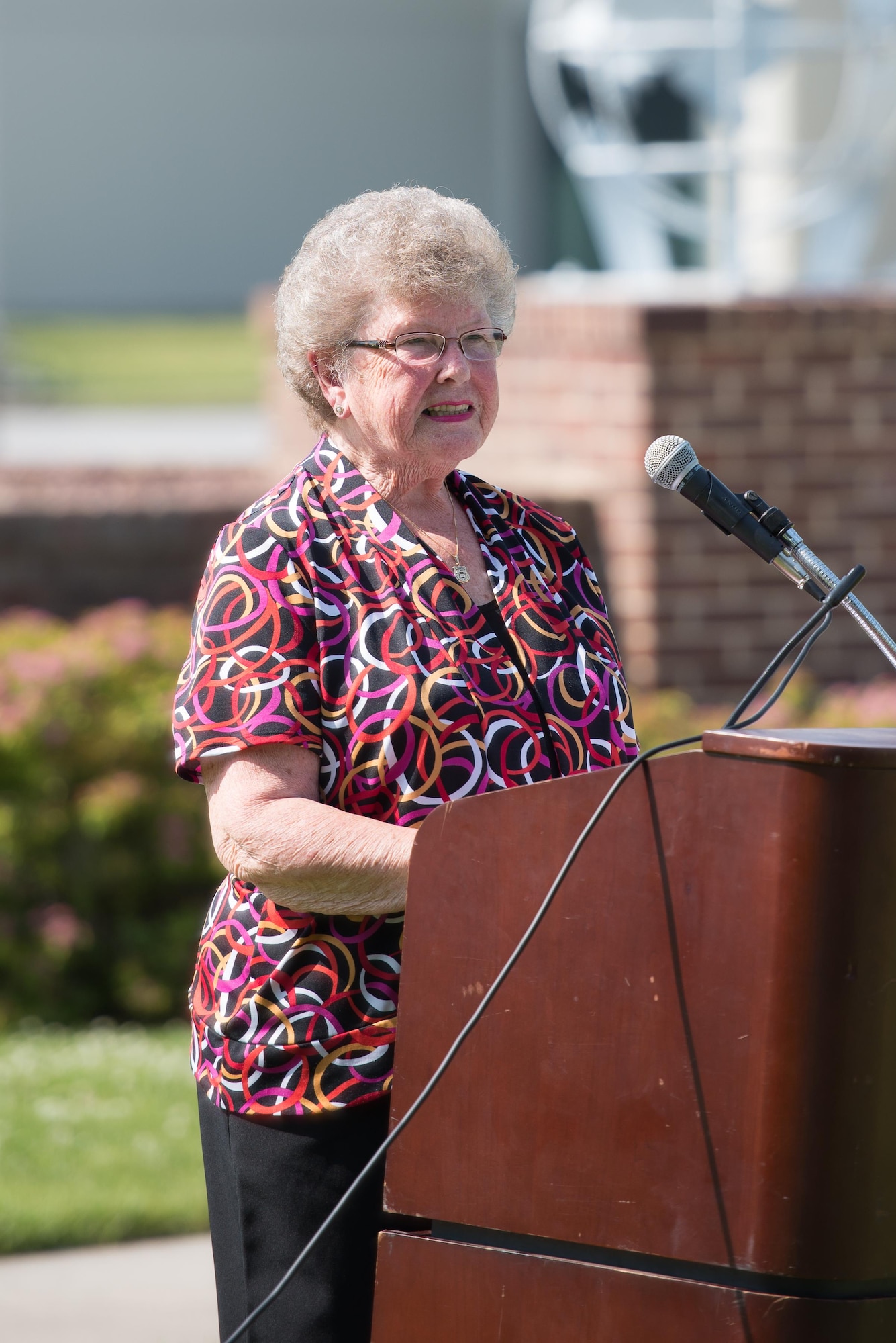 Eleanor Allione, President of Delaware Concerns of Police Survivors, speaks at a retreat ceremony commemorating fallen military and civilian law enforcement officers May 19, 2016 at Dover Air Force Base, Del. Allione’s daughter was a law enforcement officer who was killed in the line of duty. (U.S. Air Force photo by Mauricio Campino)