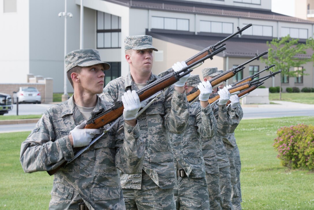 Members of the Dover Air Force Base Honor Guard fire M14 rifles in a three-volley salute during a retreat ceremony May 19, 2016 at Dover Air Force Base, Del. The ceremony commemorated fallen military and civilian law enforcement officers. (U.S. Air Force photo by Mauricio Campino)