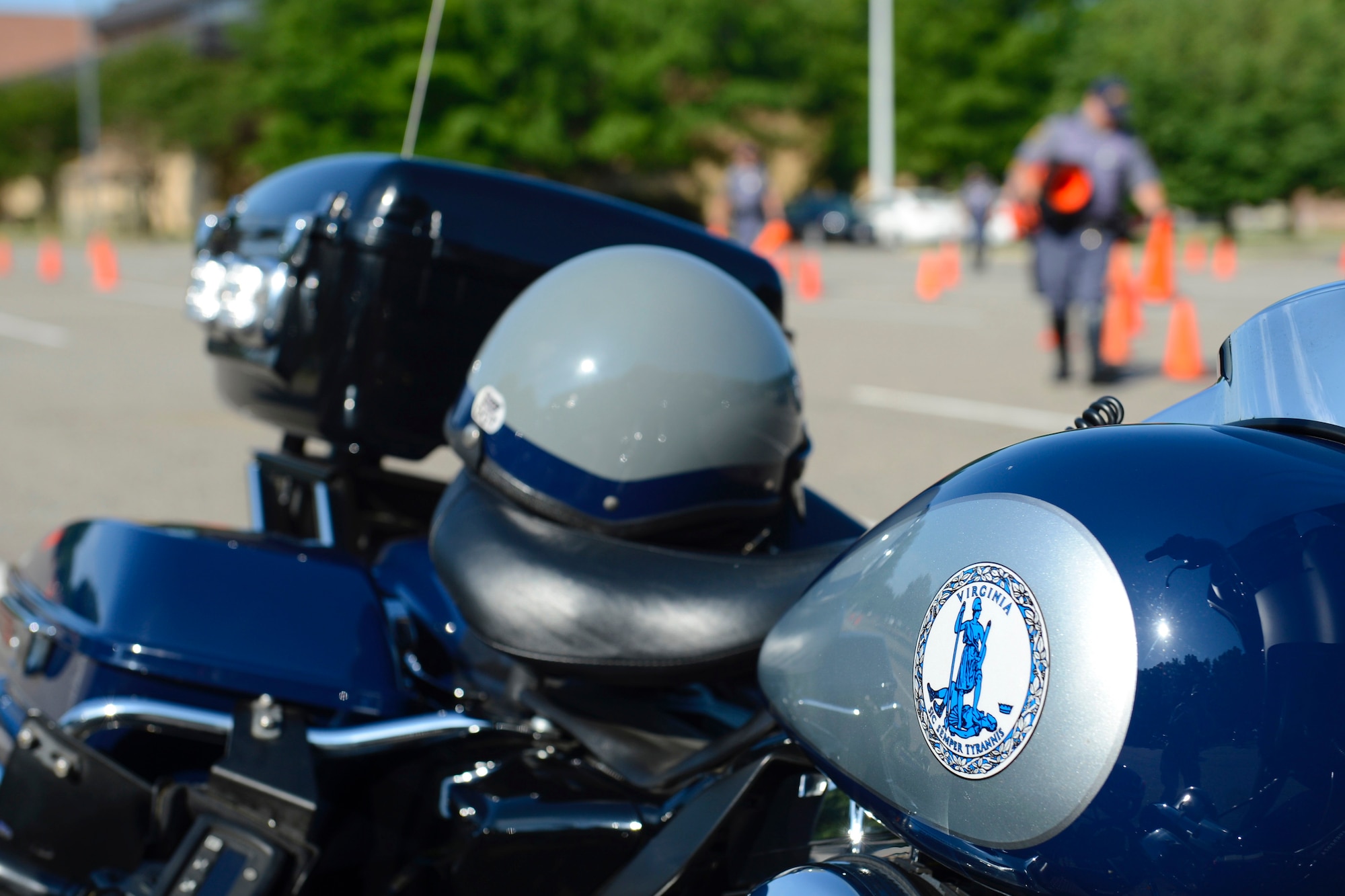 Members of the Virginia State Police Motorcycle Unit set up cones for a riding demonstration at the Armed Forces Motorcycle Safety event and ride at Joint Base Langley-Eustis, Va., May 19, 2017. The event was hosted by the 633rd Air Base Wing Safety Office and is an annual requirement for all military motorcycle riders. (U.S. Air Force photo/Airman 1st Class Kaylee Dubois)