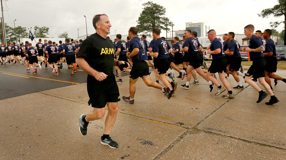 Army General Robert B. "Abe" Abrams, left foreground, commander of U.S. Army Forces Command, runs alongside paratroopers assigned to the 82nd Airborne Division during the All American Week division run on Longstreet Road at Fort Bragg, N.C., May 22, 2017. Army photo by Spc. Dustin D. Biven