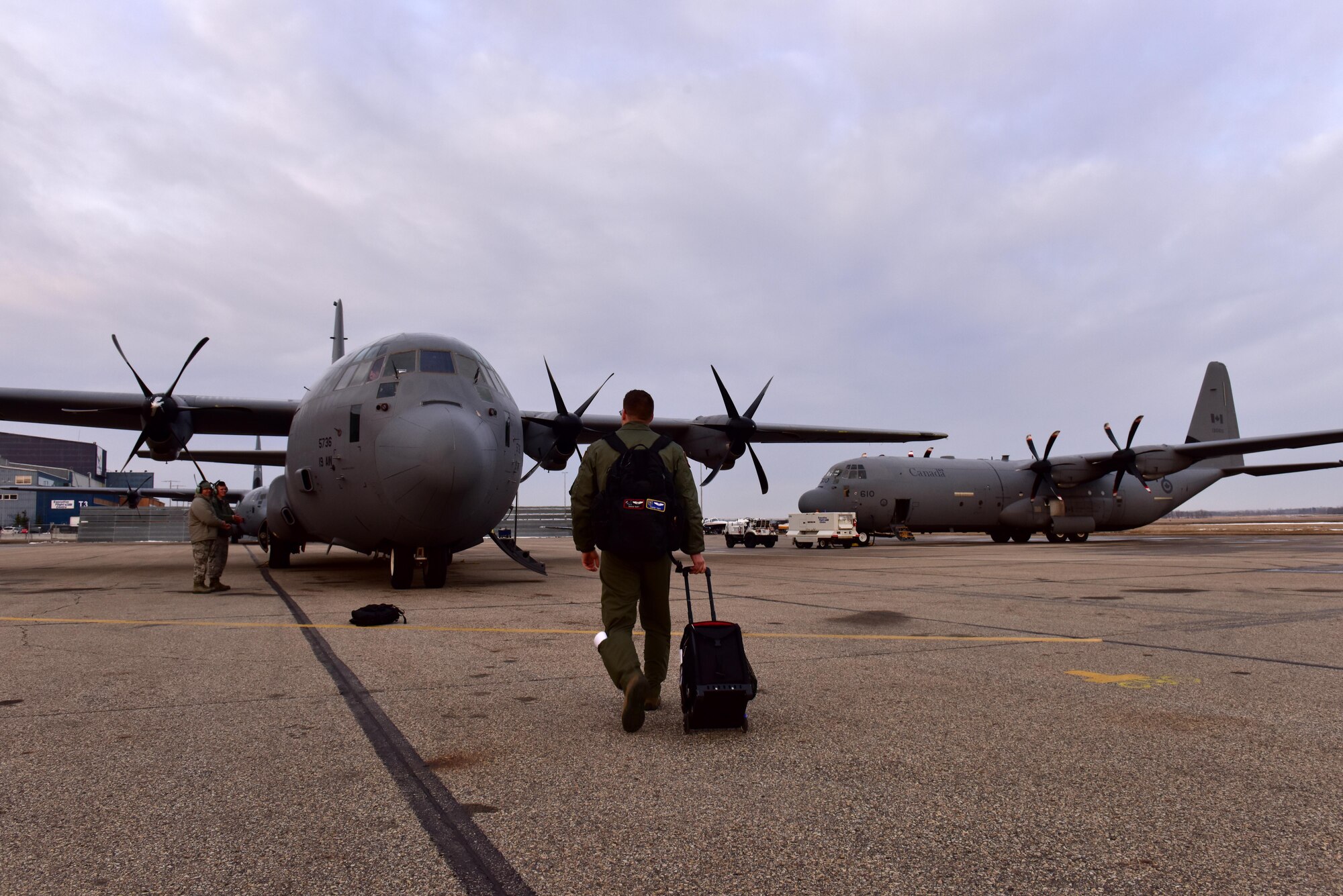 U.S. Air Force Capt. David Tart, 41st Airlift Squadron pilot, steps to his C-130J in preparation for the first Fanatic Pegasus exercise mission with Royal Canadian air forces in Edmonton, Canada, April 20, 2017. This is the first time American forces have participated in this exercise which establishes air and ground forces in unfamiliar terrain to work on communication and rapid deployment of those resources.
(U.S. Air Force photo by Staff Sgt. Jeremy McGuffin)