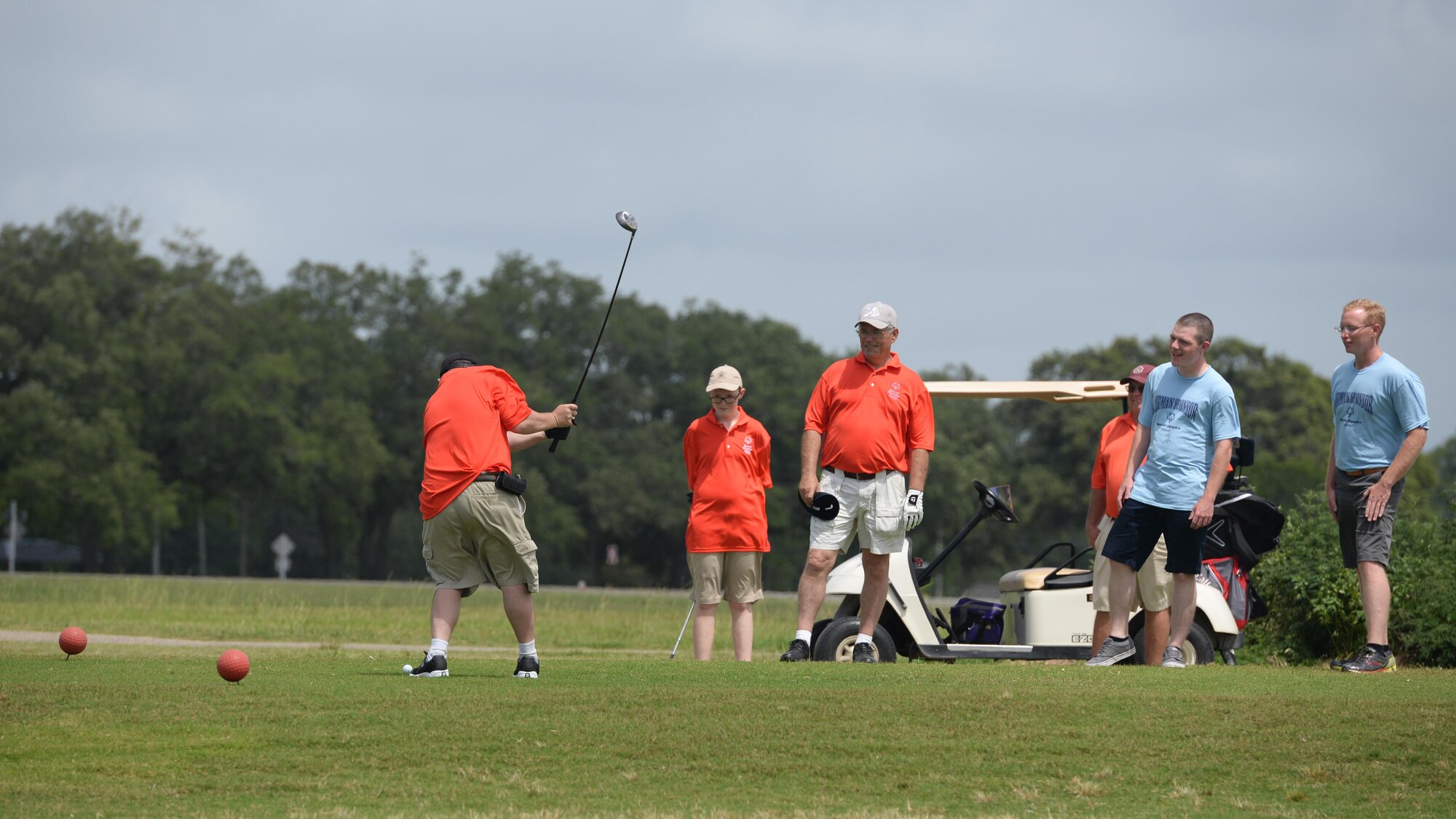 A Special Olympics athlete golfs during the Special Olympics Mississippi 2017 Summer Games at the Bay Breeze Golf Course May 20, 2017, on Keesler Air Force Base, Miss. Keesler hosted more than 3,200 athletes, directors, coaches, family members and volunteers spanning over 16 regions across Mississippi for the 31st year. (U.S. Air Force photo by Airman 1st Class Travis Beihl)