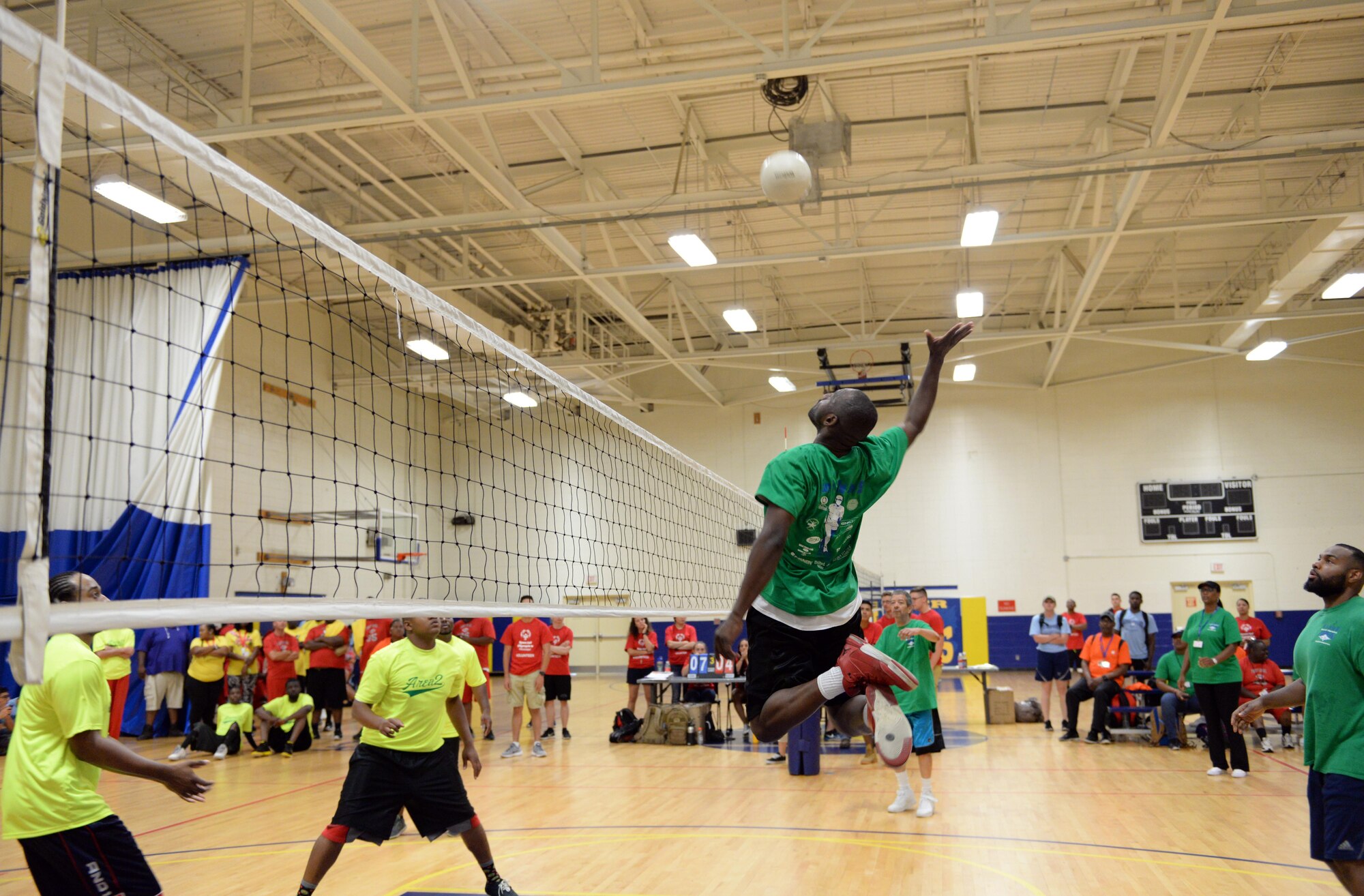 Area 2 and Area 4 athletes compete in the upper division volleyball championship during the Special Olympics Mississippi 2017 Summer Games at the Blake Fitness Center May 20, 2017, on Keesler Air Force Base, Miss. Founded in 1968, Special Olympics hosts sporting events around the world for people of all ages with special needs to include more than 700 athletes from Mississippi. (U.S. Air Force photo by 2nd Lt. Teddy Barbosa)