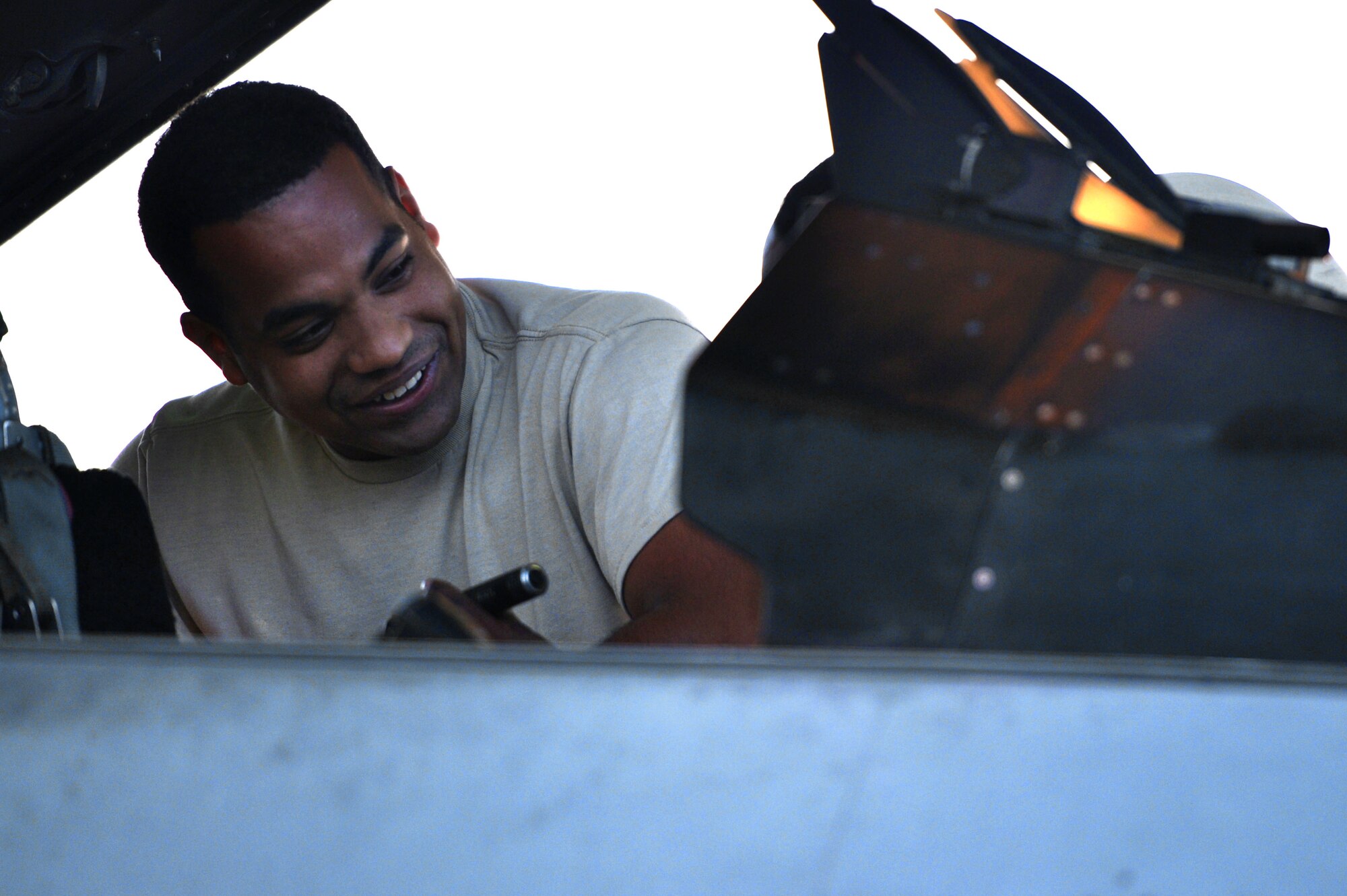 U.S. Air Force Staff Sgt. Edwin Velez, 20th Aircraft Maintenance Squadron avionics journeyman, inspects the cockpit of an F-16CM Fighting Falcon during operational readiness exercise (ORE) Weasel Victory 17-07 at Shaw Air Force Base, S.C., May 15, 2017. The ORE gave Airmen the opportunity to perform their primary duties in a simulated deployed environment. (U.S. Air Force photo by Airman 1st Class Christopher Maldonado)