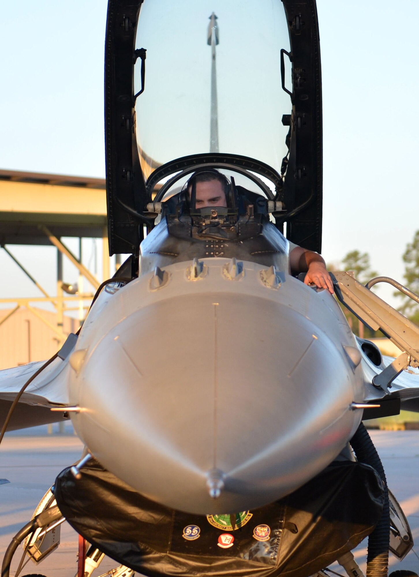 U.S. Air Force Staff Sgt. Devin Borger, 20th Aircraft Maintenance Squadron tactical aircraft maintainer, performs a pre-flight check on an F-16CM Fighting Falcon during operational readiness exercise Weasel Victory 17-07 at Shaw Air Force Base, S.C., May 15, 2017. Pre-flight checks are performed by maintainers and pilots to ensure aircraft meet all safety specifications and are ready for flight. (U.S. Air Force photo by Airman 1st Christopher Maldonado)