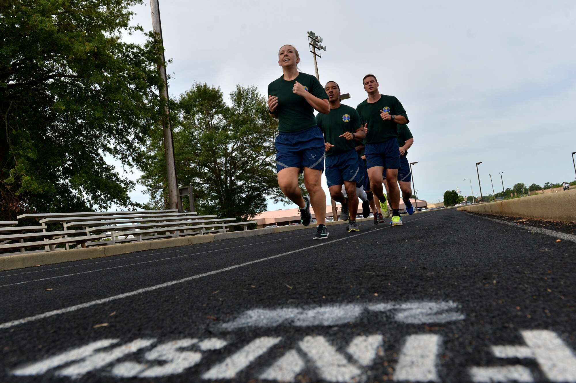 U.S. Airmen assigned to the 20th Medical Support Squadron approach the finish line of the suppression of enemy air defense (SEAD) relay race during the 20th Operation Group hosted warrior day combat challenge at Shaw Air Force Base, S.C., May 19, 2017. This event provided an opportunity for Airmen to gain a better understanding of the 20th Fighter Wing’s SEAD mission while enhancing their physical and mental fitness in a series of events. (U.S. Air Force photo by Airman 1st Class Christopher Maldonado)