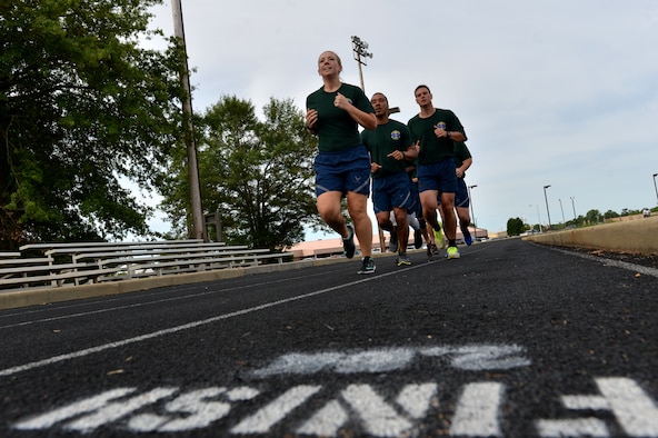 U.S. Airmen assigned to the 20th Medical Support Squadron approach the finish line of the suppression of enemy air defense (SEAD) relay race during the 20th Operation Group hosted warrior day combat challenge at Shaw Air Force Base, S.C., May 19, 2017. This event provided an opportunity for Airmen to gain a better understanding of the 20th Fighter Wing’s SEAD mission while enhancing their physical and mental fitness in a series of events. (U.S. Air Force photo by Airman 1st Class Christopher Maldonado)