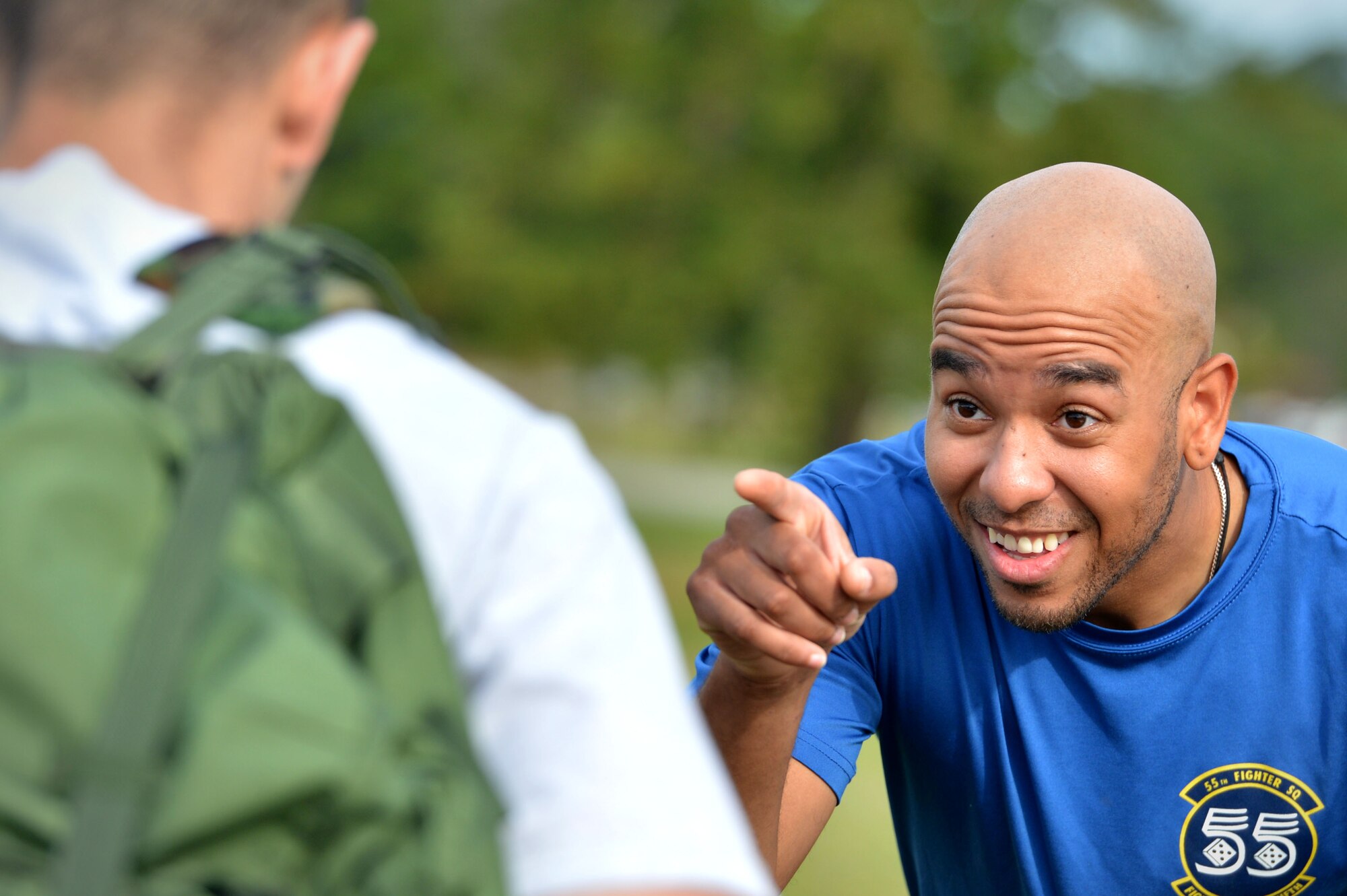 U.S. Air Force Senior Airman Rodney Foxworth-Hill, 55th Fighter Squadron aviation resource management technician, waits for an Airman to answer a trivia question as part of an obstacle course during the 20th Operations Group-hosted warrior day challenge at Shaw Air Force Base, S.C., May 19, 2017. Foxworth-hill quizzed Airmen on fighter squadron and Air Force trivia throughout the course. (U.S. Air Force photo by Airman 1st Class Christopher Maldonado)