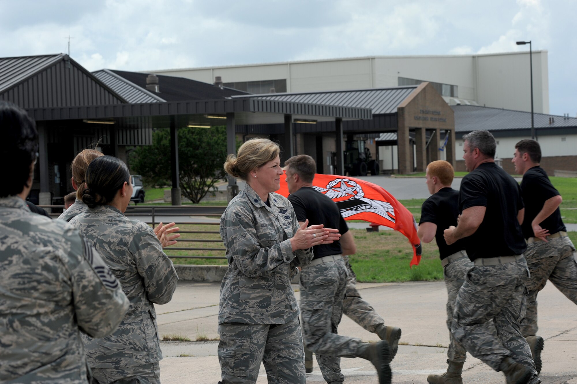U.S. Air Force Reserve Lt. Col. Deanna Sicard, executive officer, 913th Airlift Group, congratulates members of the 96th Aerial Port Squadron and the 19th Logistics Readiness Squadron as they finish a 2.2 mile run at Little Rock Air Force Base, Ark., May 19, 2017. Members of the two units came together during the “4th Annual Port Dawg Memorial Run” to honor those in the air transportation career field across the Air Force who lost their lives in 2016. (U.S. Air Force photo by Airman 1st Class Grace Nichols/Released)