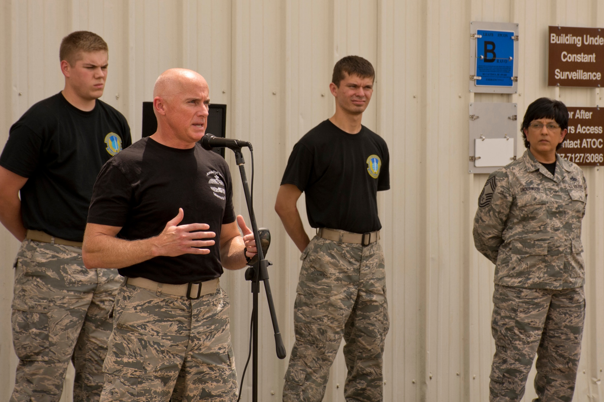 U.S. Air Force Maj. Peyton S. Smith, commander, 19th Logistic Readiness Squadron, speaks to the gathering before the 4th Annual Port Dawg Memorial Run May 19, 2017, at Little Rock Air Force Base, Ark. Members of the 96 APS and the 19th Logistics Readiness Squadron joined together for the 2.2 mile run honoring “Port Dawgs” across the Air Force who lost their lives in 2016. (U.S. Air Force photo by Master Sgt. Jeff Walston/Released)
