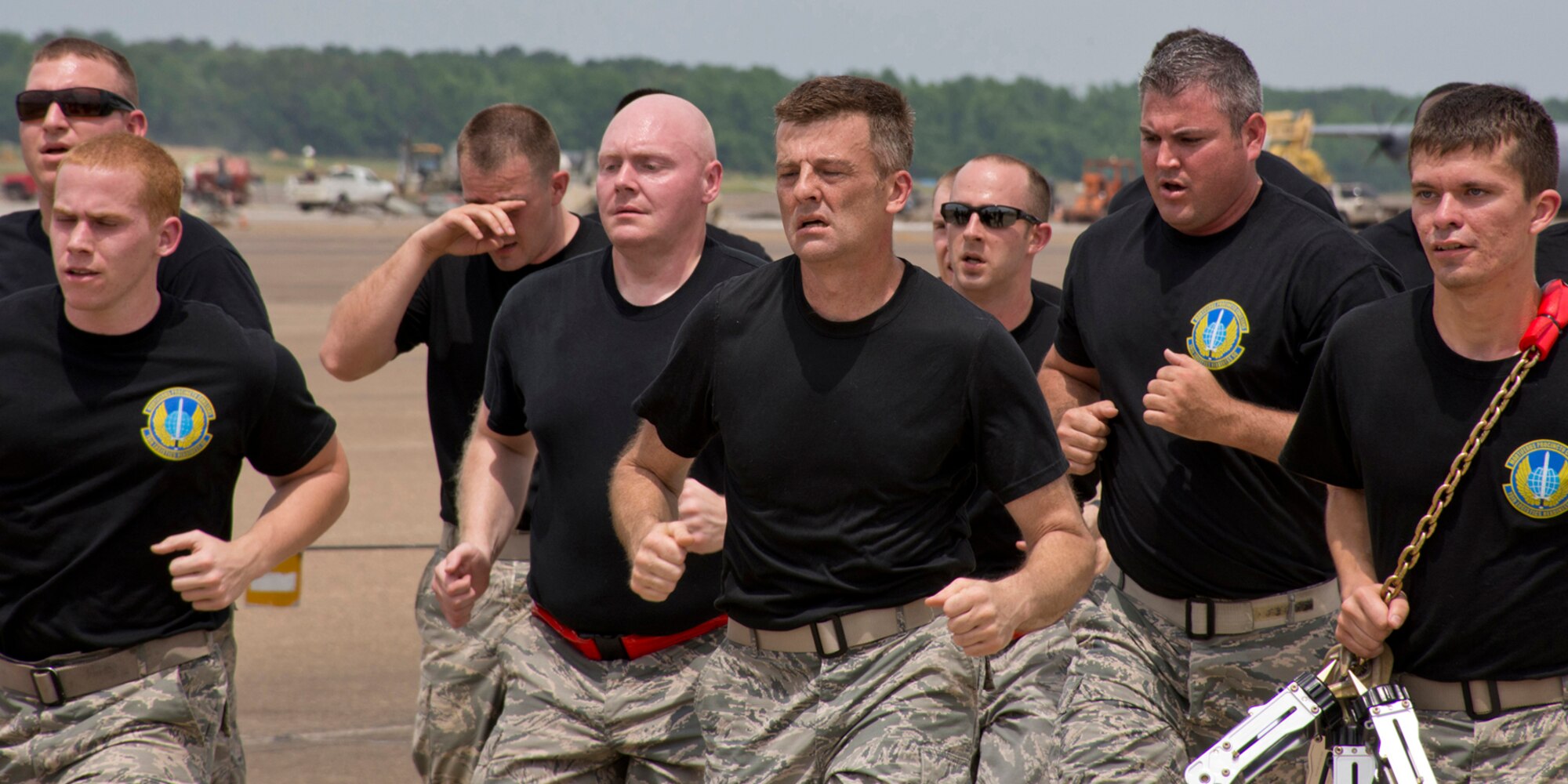 Members of the 96th Aerial Port Squadron and the 19th Logistics Readiness Squadron participate in the “4th Annual Port Dawg Memorial Run” at Little Rock Air Force Base, Ark., May 19, 2017. The 2.2 mile run honored those Port Dawgs across the Air Force who lost their lives in 2016. (U.S. Air Force photo by Master Sgt. Jeff Walston/Released)