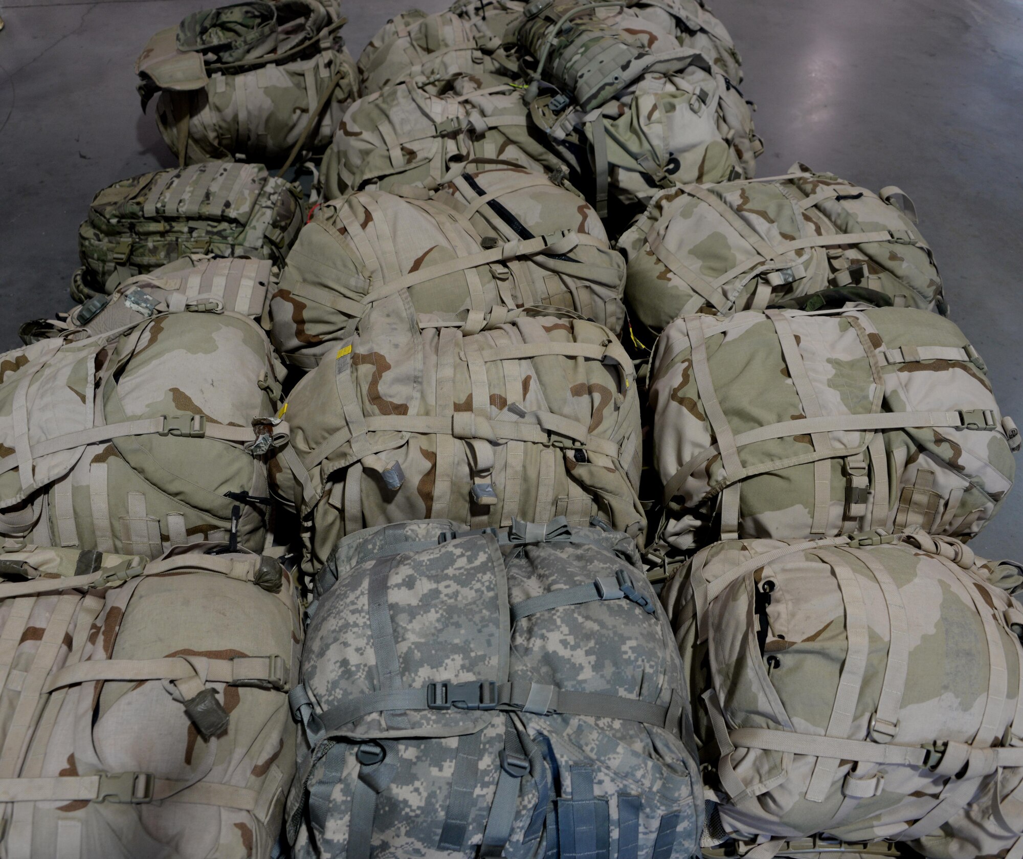 Several ruck-sacks wait to be carried 6.2 miles during the 7th Annual Gold Star Families Ruck March at Travis Air Force Base, Calif., May 20, 2017. The annual ruck march, which featured 275 participants, is held by the Travis First Sergeant's Council to support Gold Star Families. (U.S. Air Force photo/Tech. Sgt. James Hodgman)