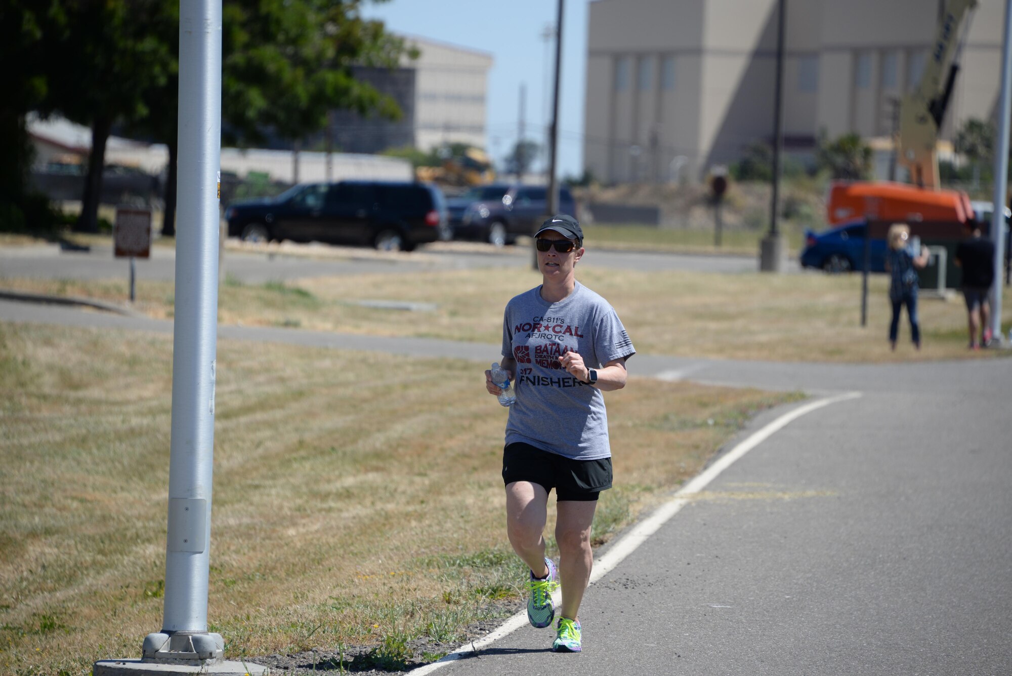 One of 275 participants nears the finish line of the 7th Annual Gold Star Families Ruck March May 20, 2017 at Travis Air Force Base, Calif. The event is held every year by the Travis First Sergeant's Council to support Gold Star Families. (U.S. Air Force photo/Tech. Sgt. James Hodgman)